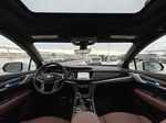 White[Crystal White Tricoat] 2025 Cadillac XT5 Sport Left Rear Corner Photo in Calgary AB
