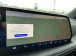 White[Iridescent Pearl Tricoat] 2025 Chevrolet Tahoe Z71 Navigation Screen Closeup Photo in Calgary AB