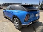 Blue[Coastal Blue Metallic] 2025 Cadillac OPTIQ Left Rear Corner Photo in Edmonton AB