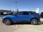 Blue[Coastal Blue Metallic] 2025 Cadillac OPTIQ Left Side Photo in Edmonton AB