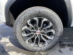 White[Summit White] 2025 GMC Canyon Denali Left Front Rim and Tire Photo in Calgary AB