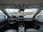 Blue[Deep Crystal Blue Mica] 2021 Mazda CX-5 Grand Touring Strng Wheel/Dash Photo: Frm Rear in Calgary AB