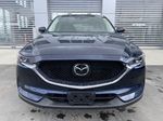 Blue[Deep Crystal Blue Mica] 2021 Mazda CX-5 Grand Touring Front Vehicle Photo in Calgary AB