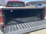 Red[Radiant Red] 2006 Toyota Tacoma Trunk / Cargo Area Photo in Edmonton AB
