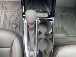 Red[Crimson Metallic] 2025 Chevrolet Trax Center Console Photo in Calgary AB