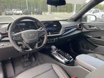 Red[Crimson Metallic] 2025 Chevrolet Trax Steering Wheel and Dash Photo in Calgary AB