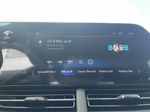 Red[Crimson Metallic] 2025 Chevrolet Trax Radio Controls Closeup Photo in Calgary AB
