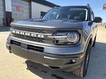 Gray[Carbonized Grey Metallic] 2022 Ford Bronco Sport Left Front Head Light / Bumper and Grill in Camrose AB