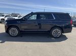 Blue[Midnight Blue Metallic] 2023 GMC Yukon Left Side Photo in Edmonton AB