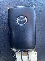 White[Snowflake White Pearl] 2021 Mazda CX-5 Key and Fob Photo in Edmonton AB