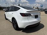 White[Pearl White Multi-Coat] 2023 Tesla Model Y Left Rear Corner Photo in Edmonton AB