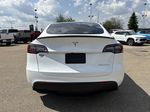 White[Pearl White Multi-Coat] 2023 Tesla Model Y Rear of Vehicle Photo in Edmonton AB