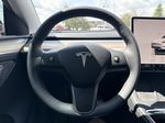 White[Pearl White Multi-Coat] 2023 Tesla Model Y Strng Wheel: Frm Rear in Edmonton AB