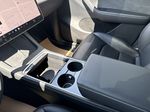 White[Pearl White Multi-Coat] 2023 Tesla Model Y Center Console Photo in Edmonton AB
