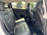 White[Pearl White Multi-Coat] 2023 Tesla Model Y Right Side Rear Seat  Photo in Edmonton AB