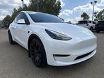 White[Pearl White Multi-Coat] 2023 Tesla Model Y Right Front Corner Photo in Edmonton AB