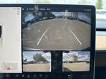 White[Pearl White Multi-Coat] 2023 Tesla Model Y Backup Camera Closeup Photo in Edmonton AB