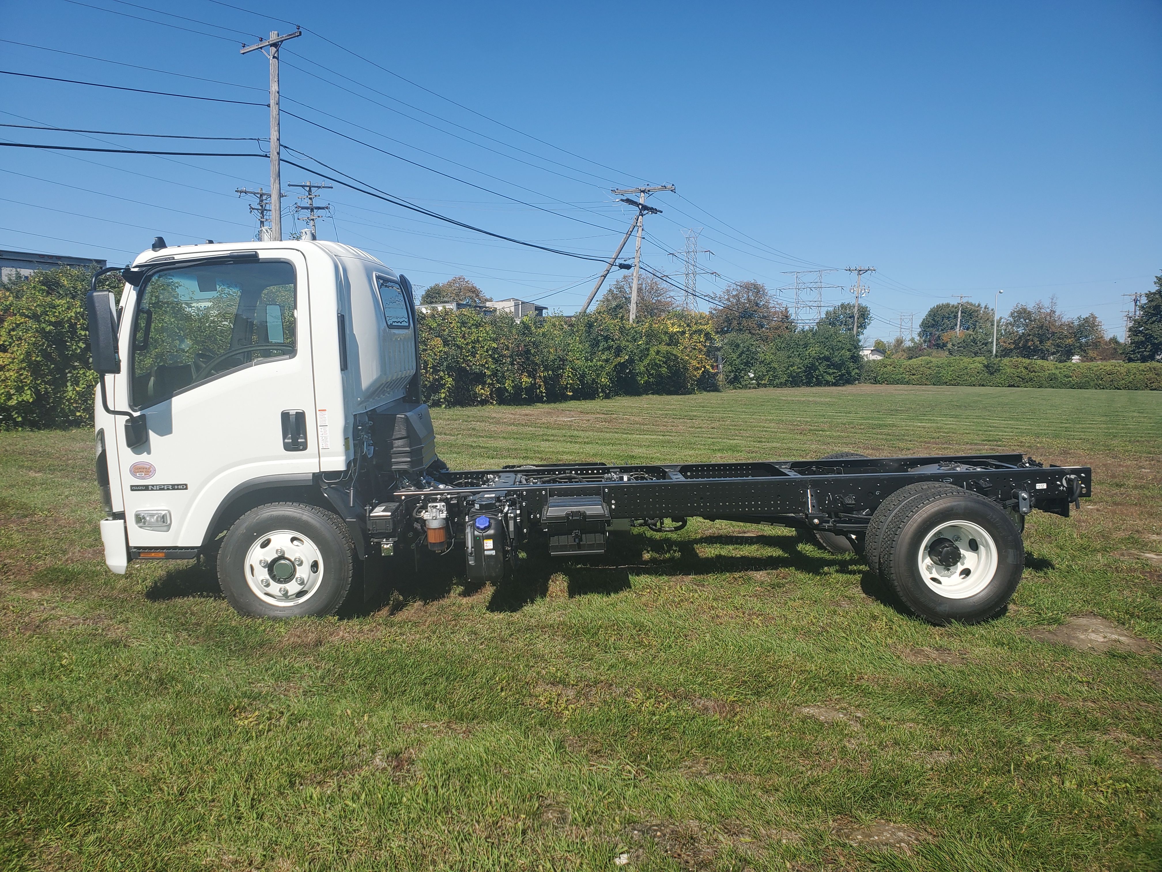 Slide images of 2027 ISUZU NPRHD