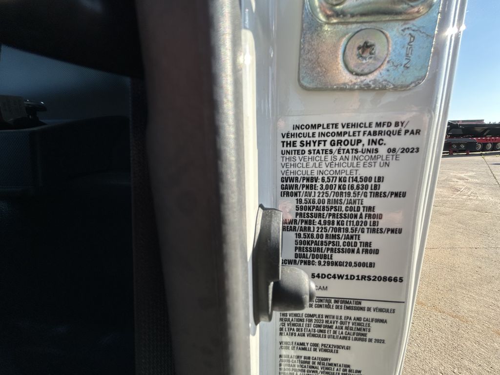 Slide images of 2024 ISUZU NPR-HD GAS