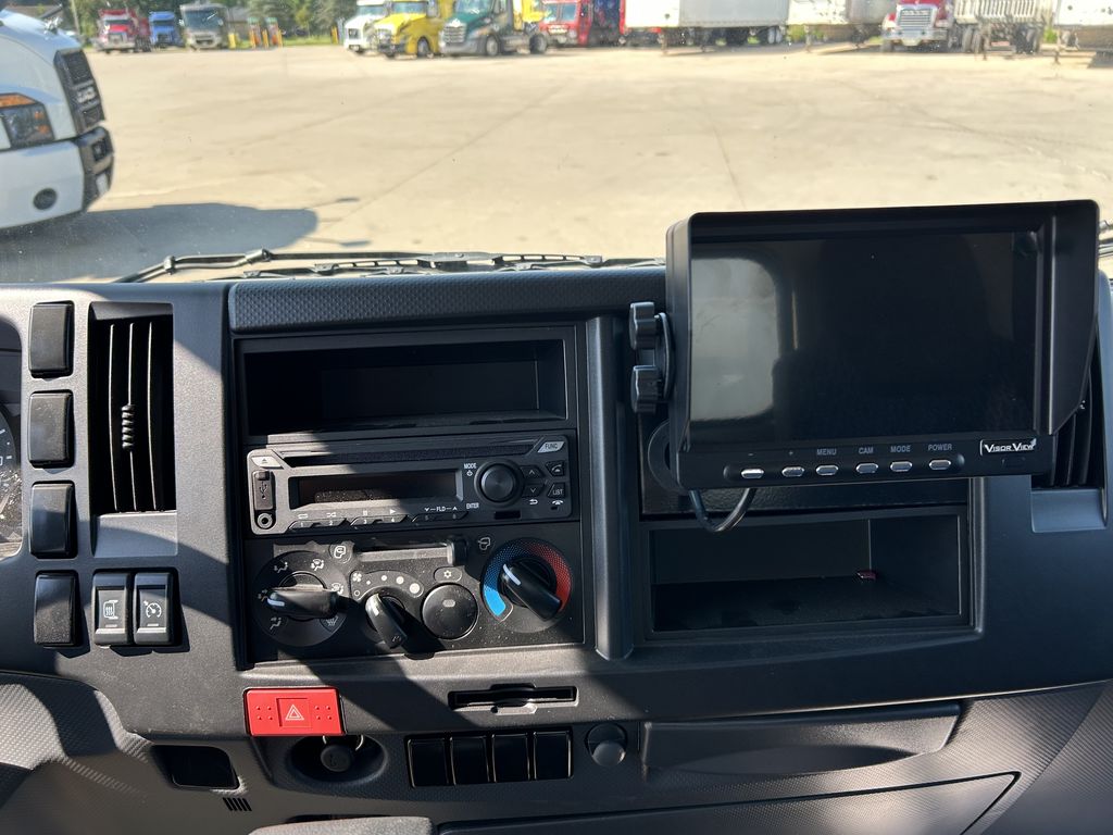 Slide images of 2024 ISUZU NPR-HD GAS