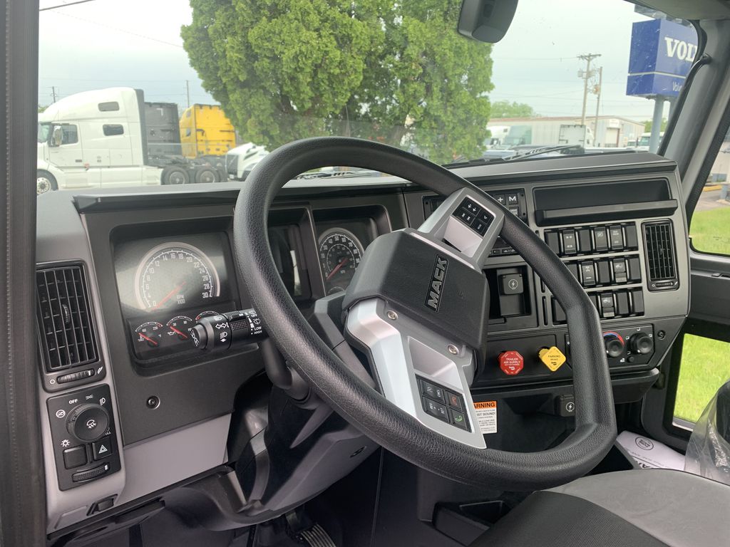 Slide images of 2026 MACK AN64T DC 