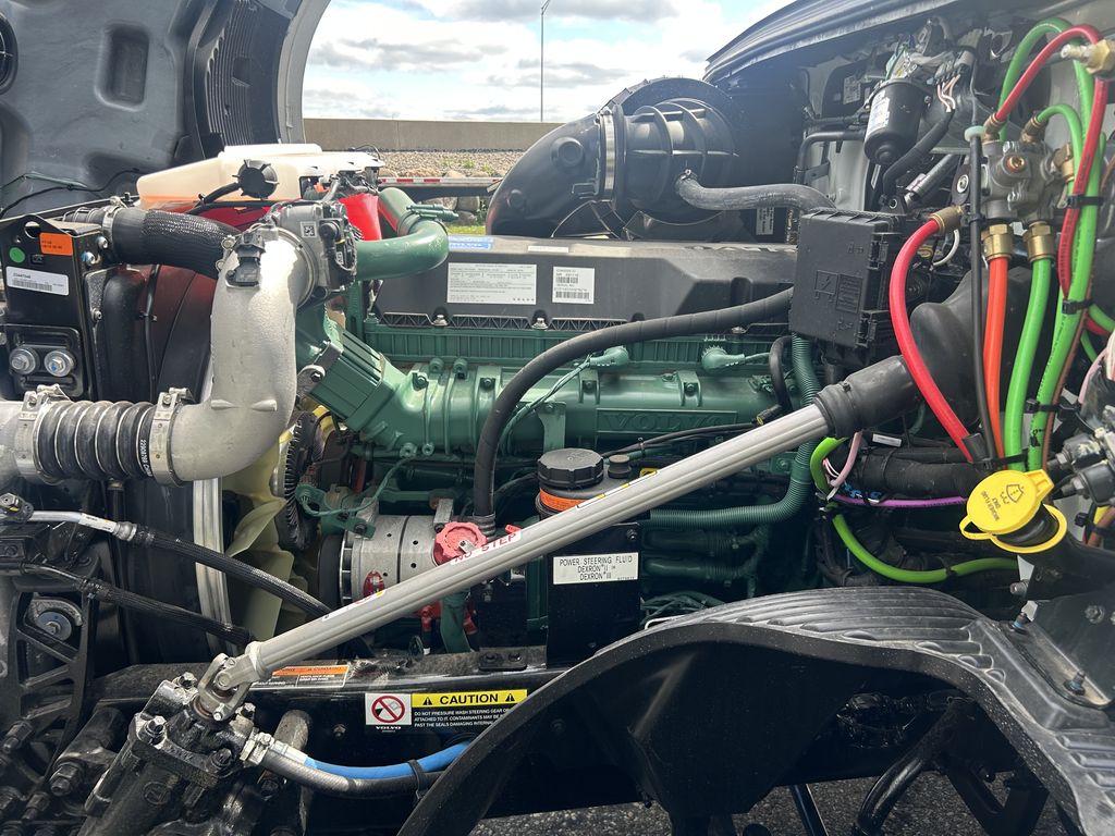 Slide images of 2025 VOLVO VNL64T300