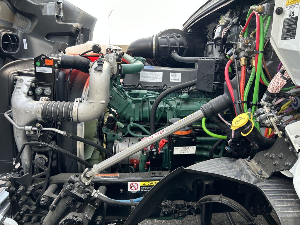 Slide images of 2025 VOLVO VNR64T300