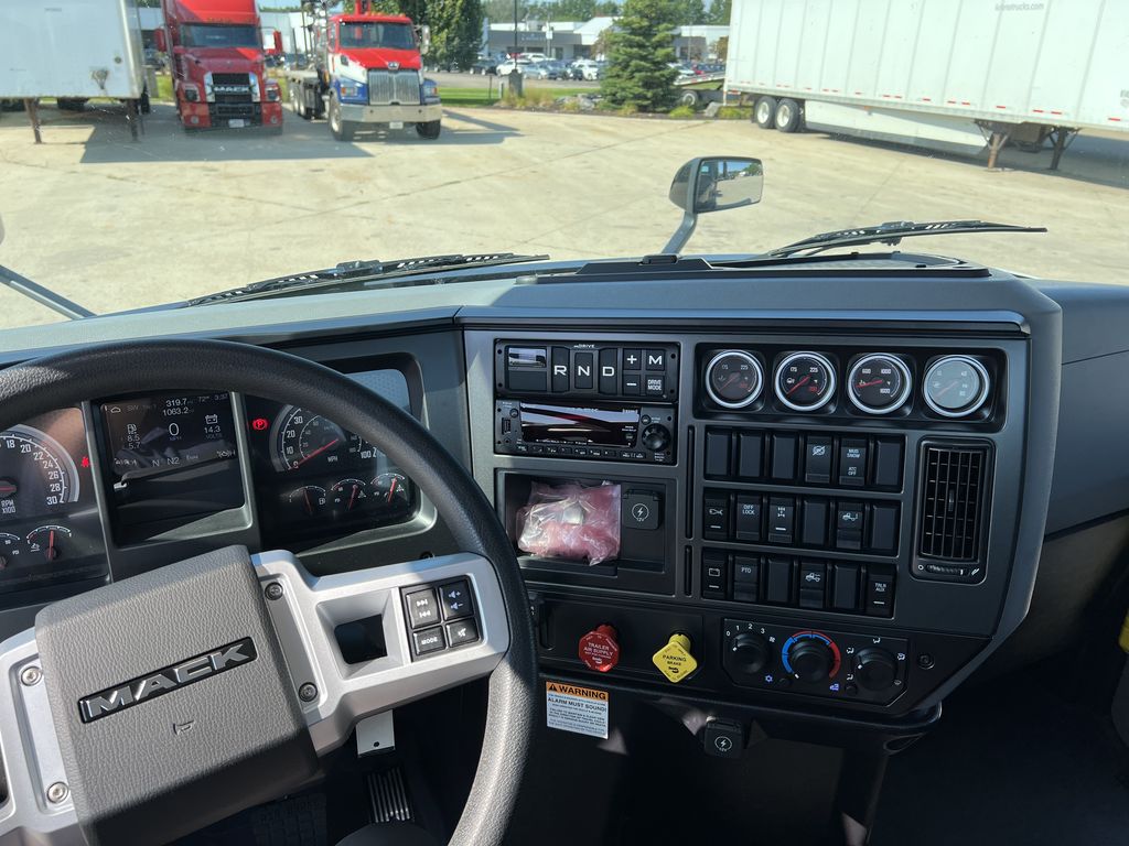 Slide images of 2026 MACK AN64T DC