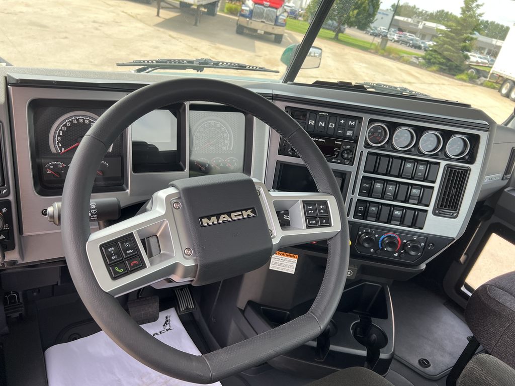 Slide images of 2026 MACK AN64T DC