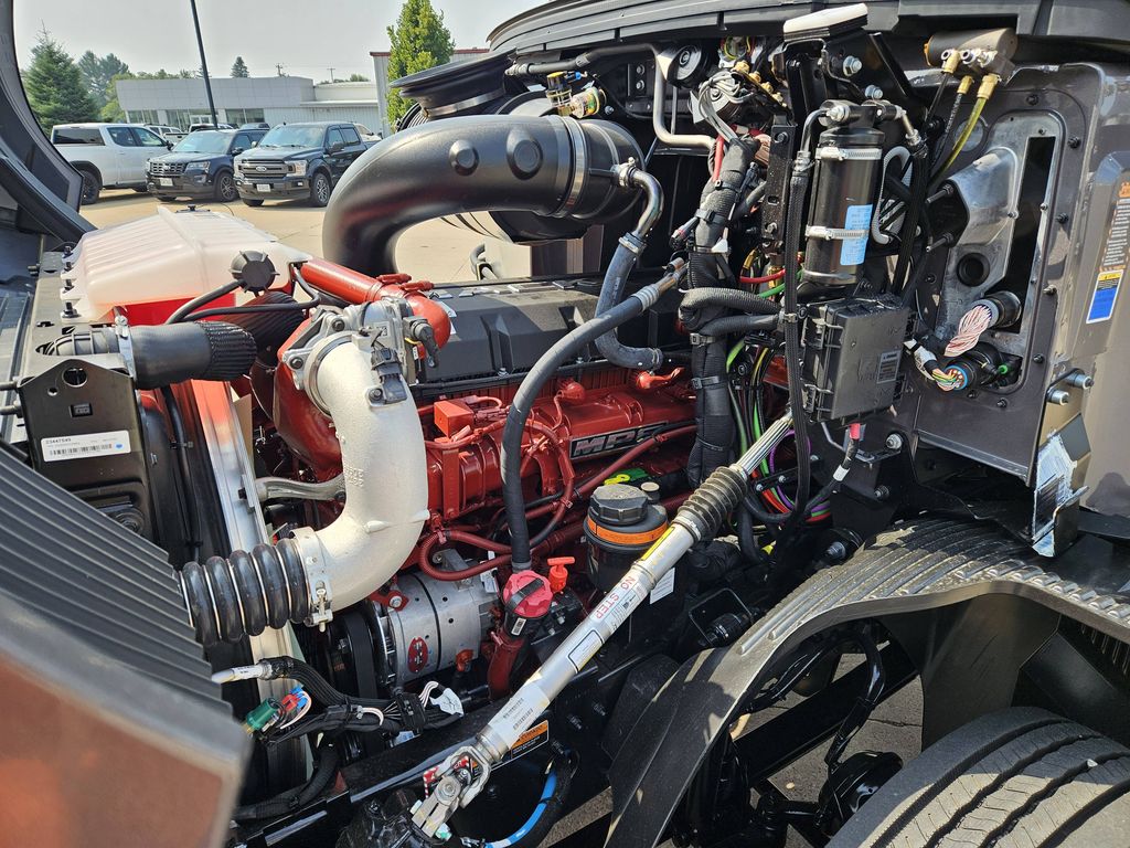 Slide images of 2026 MACK AN64T DC