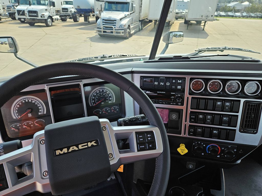 Slide images of 2026 MACK AN64T DC