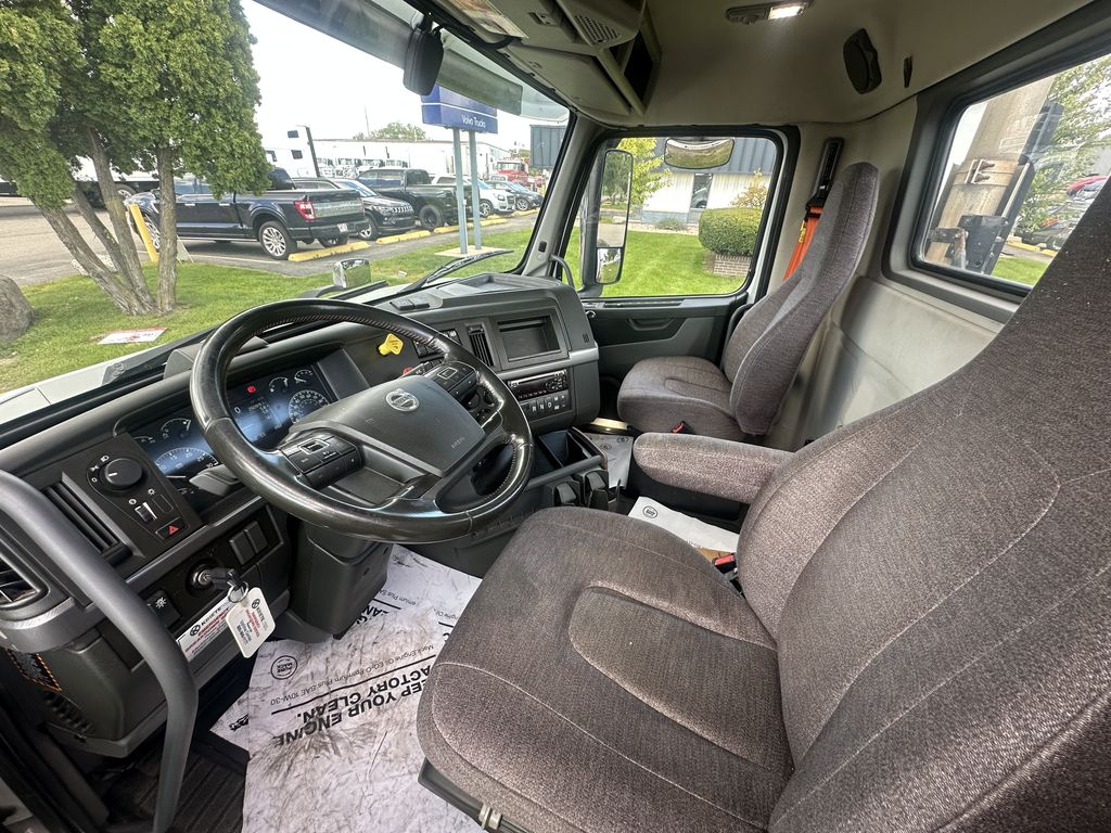 Slide images of 2021 VOLVO VNR64T300