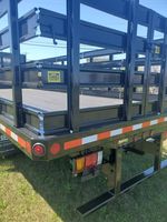 Slide images of 2024 ISUZU NPR GAS-HD