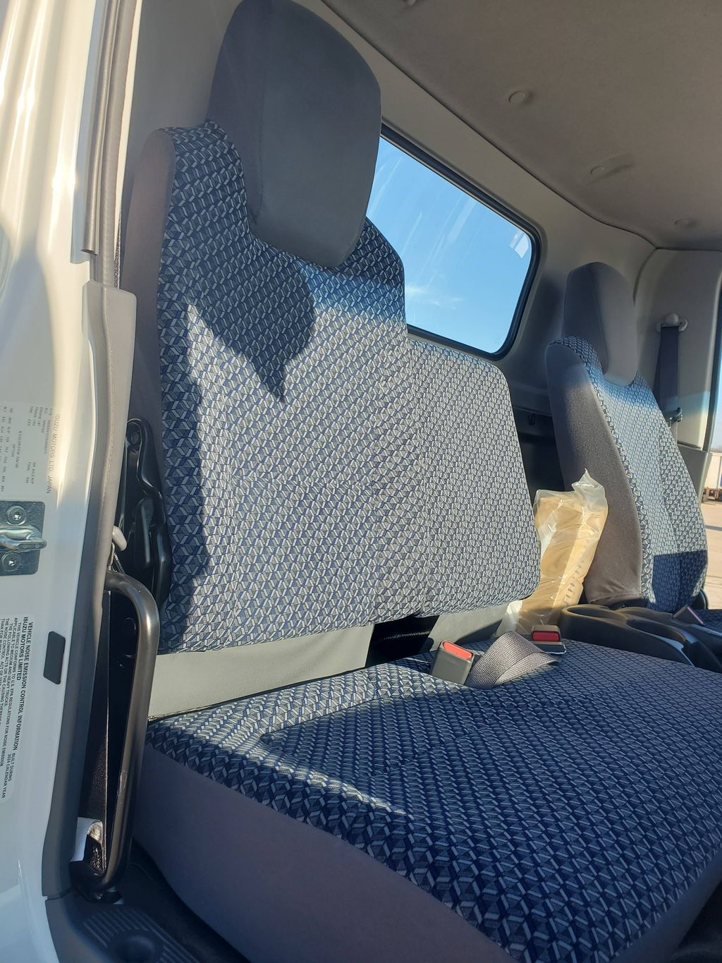 Slide images of 2025 ISUZU NRR