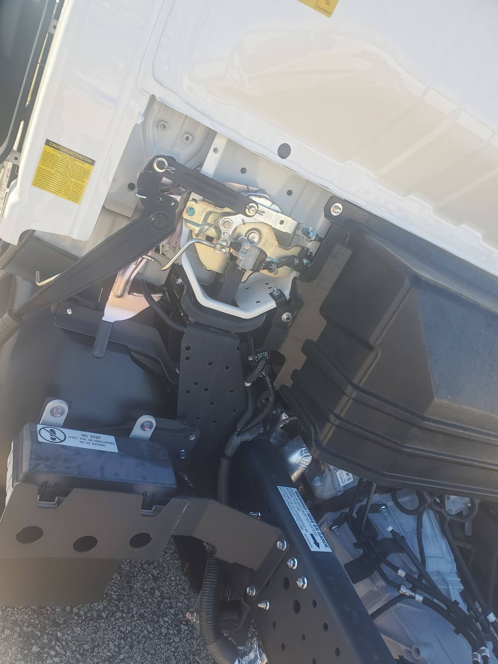 Slide images of 2024 ISUZU NPR GAS-HD