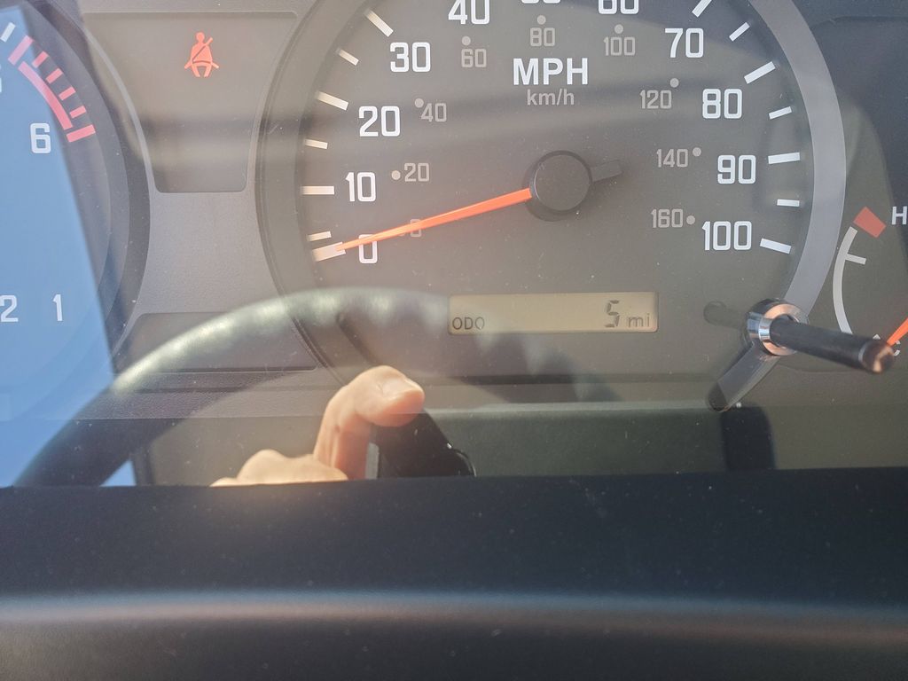 Slide images of 2024 ISUZU NPR GAS-HD