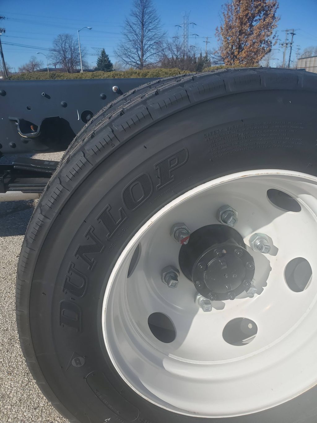 Slide images of 2024 ISUZU NPR GAS-HD