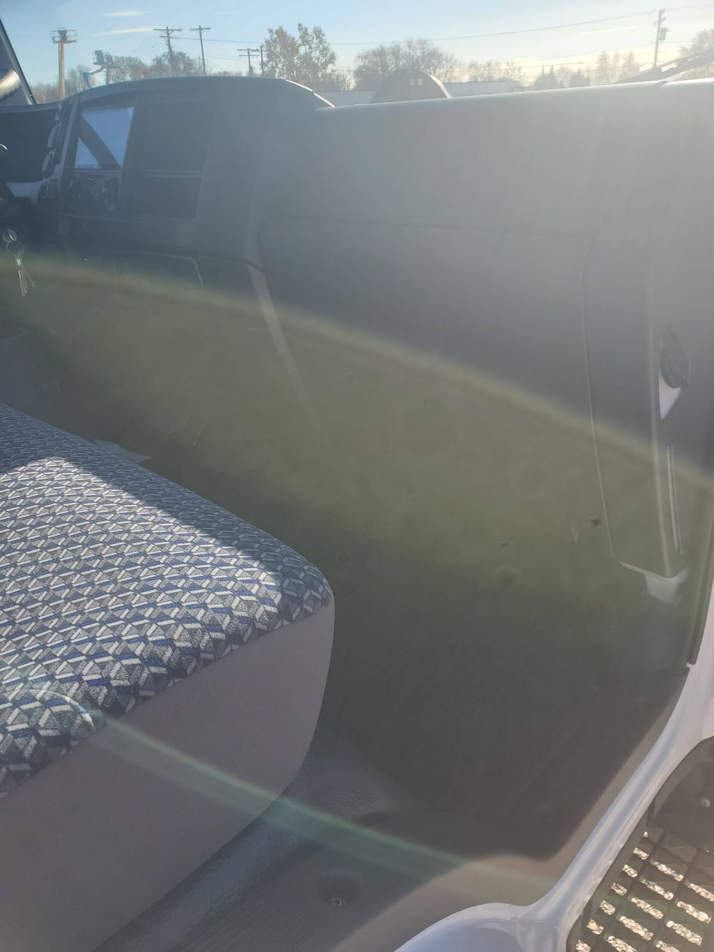 Slide images of 2025 ISUZU NPR GAS-HD