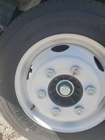 Slide images of 2025 ISUZU NPR GAS-HD