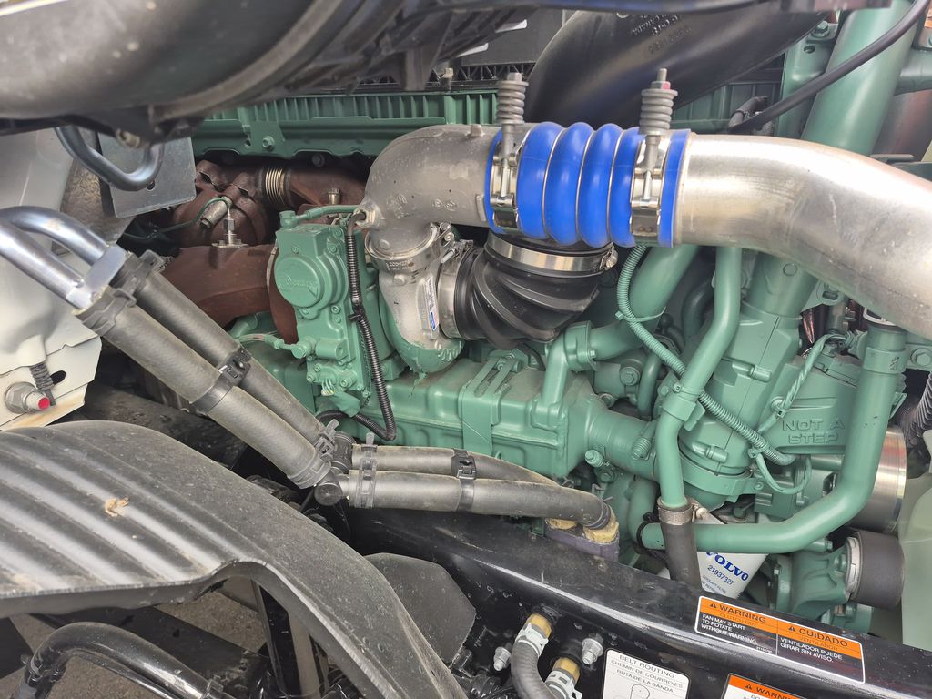 Slide images of 2025 VOLVO VNR64T300 