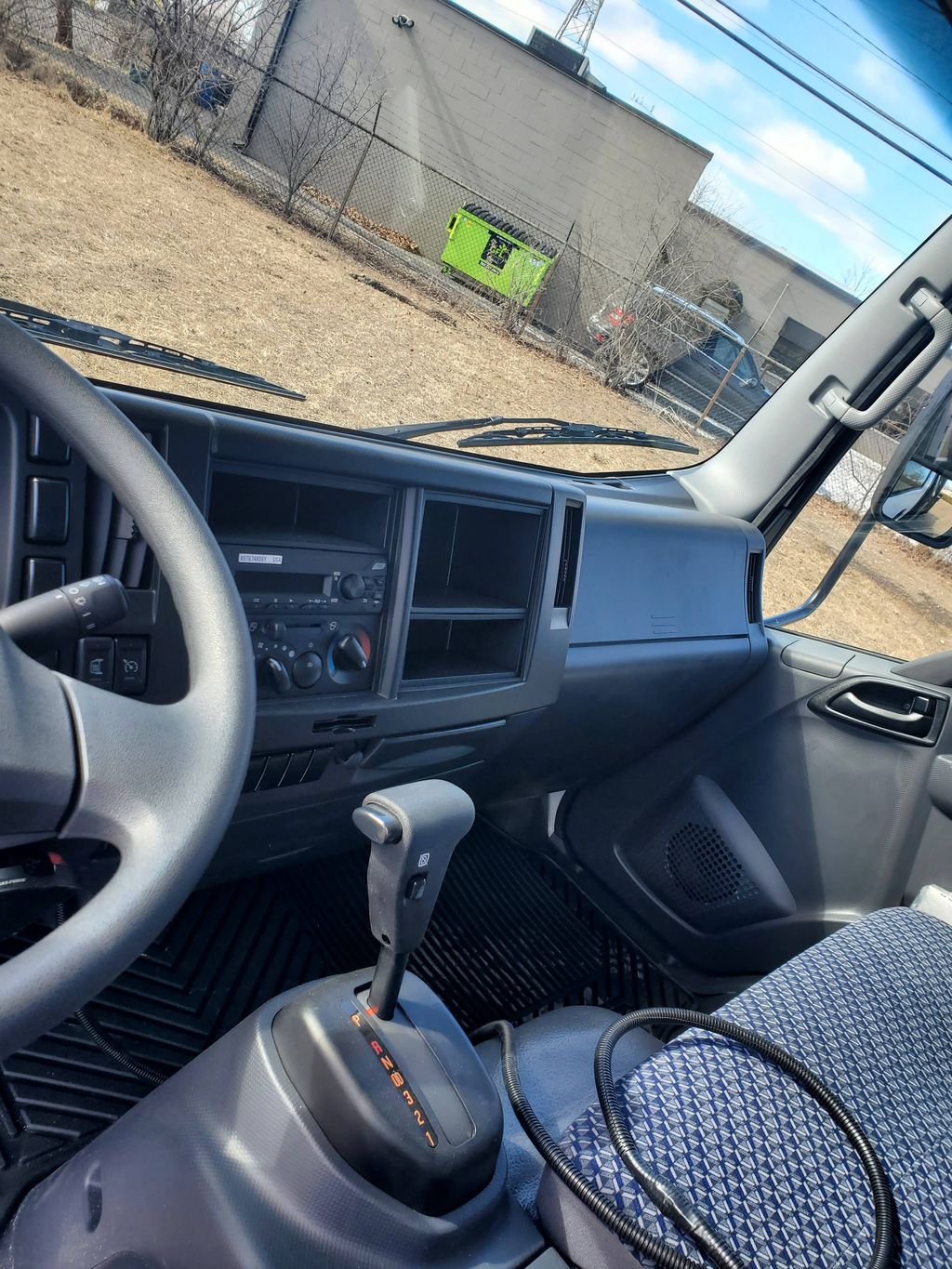 Slide images of 2026 ISUZU NRR