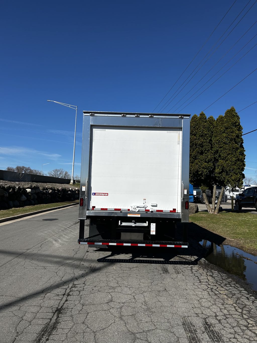 Slide images of 2026 ISUZU NPR-XD