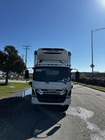 Slide images of 2026 ISUZU NPR-XD