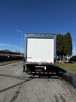 Slide images of 2026 ISUZU NPR-XD