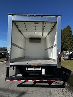 Slide images of 2026 ISUZU NPR-XD