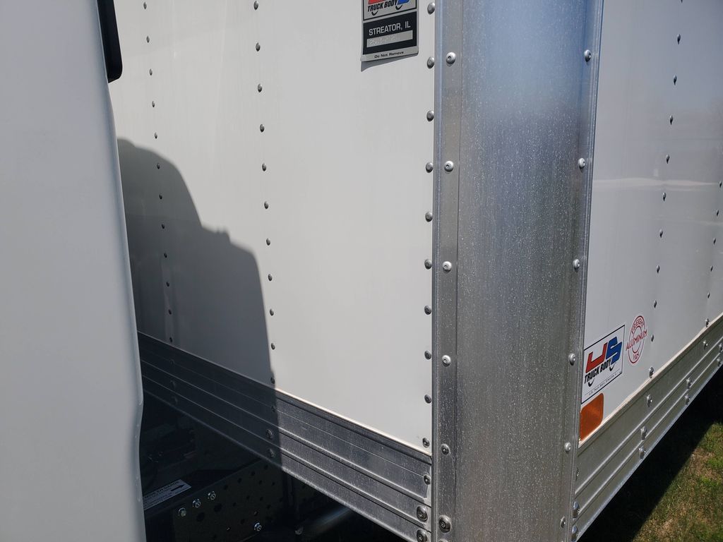 Slide images of 2026 ISUZU NPR GAS HD