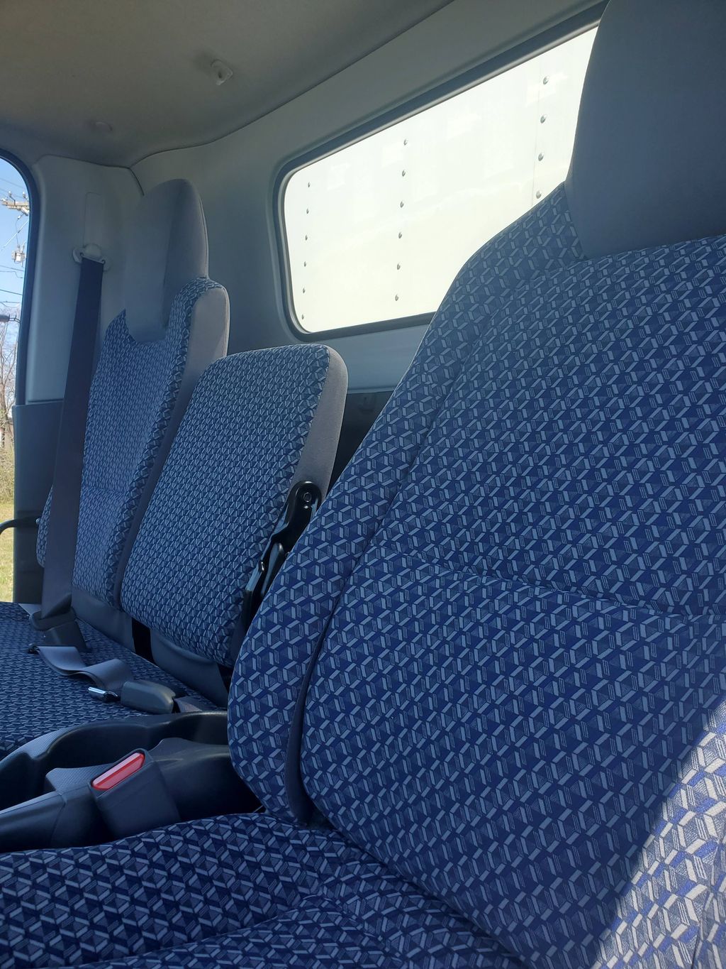Slide images of 2026 ISUZU NPR GAS HD
