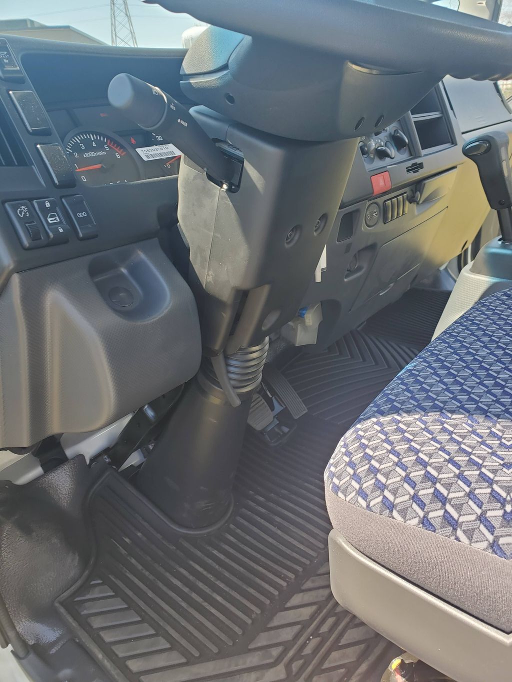 Slide images of 2026 ISUZU NPR GAS HD