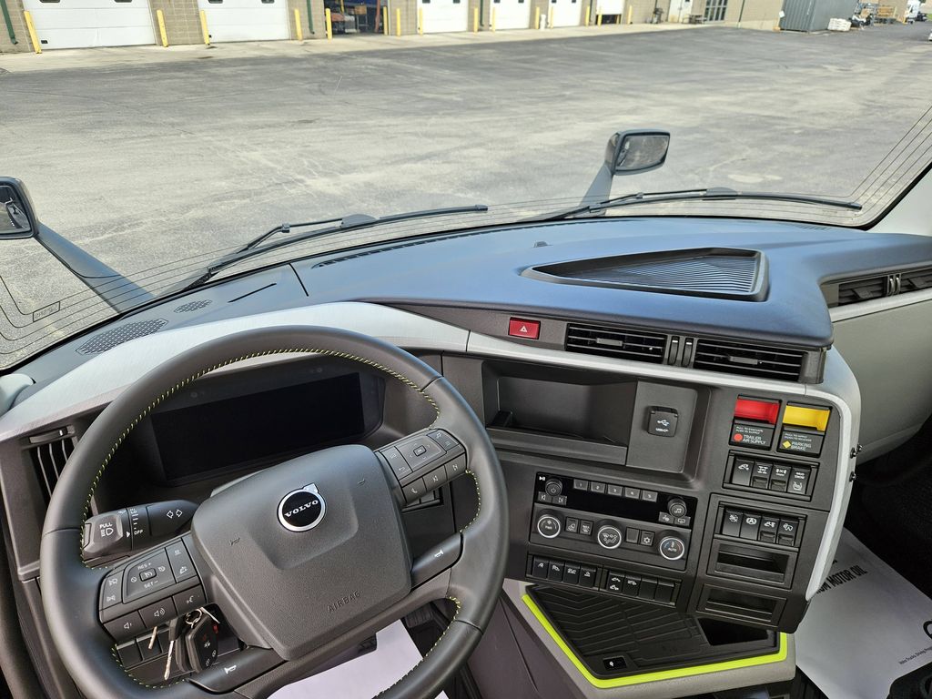 Slide images of 2027 VOLVO VNR64T300