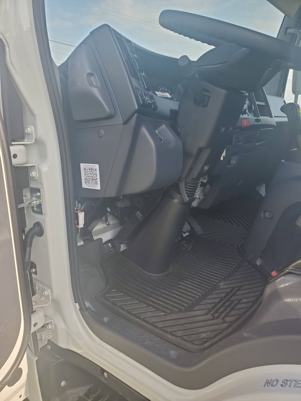 Slide images of 2026 ISUZU NPR GAS HD